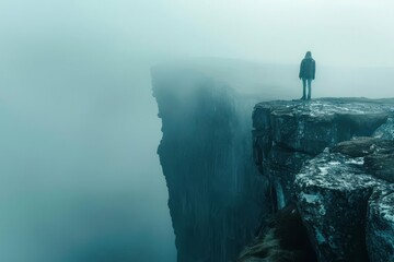 Visual of a person standing at the edge of a cliff, metaphor for mental health crisis