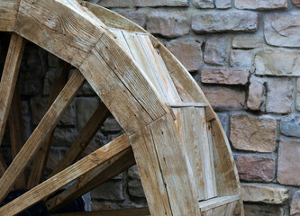 Wooden wheel of an old water mill.