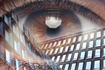 Double exposure of modern buildings and woman with beautiful eye, closeup