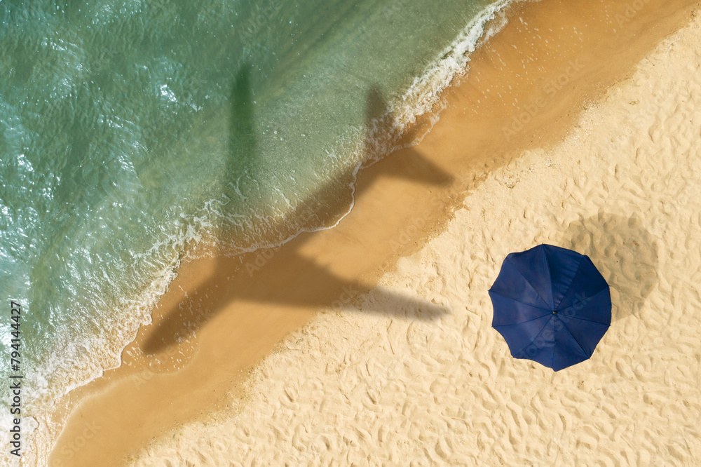 Canvas Prints Shadow of airplane above sandy coast, aerial view. Summer vacation