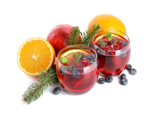 Aromatic Christmas Sangria drink in glasses, fir branches and ingredients isolated on white - obrazy, fototapety, plakaty