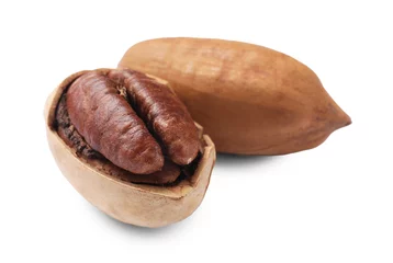 Rolgordijnen Two tasty pecan nuts isolated on white © New Africa