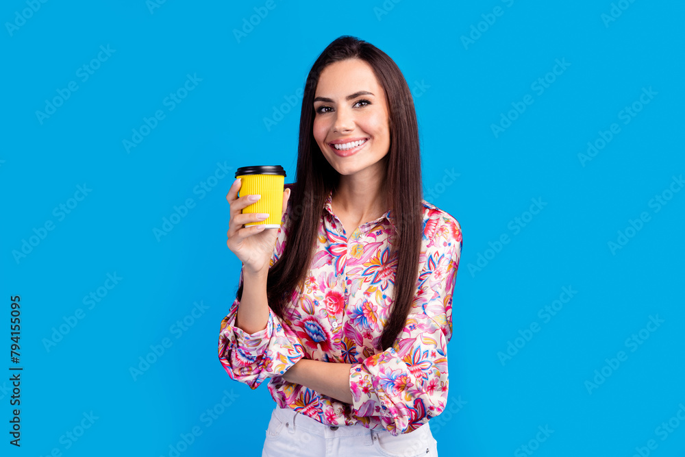 Sticker Photo of cheerful cute lady dressed print blouse enjoying hot coffee isolated blue color background