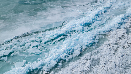 spring ice drift on the lake. ice hummocks