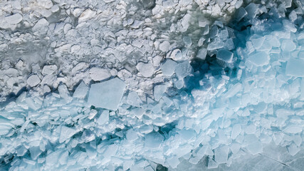 spring ice drift on the lake. ice hummocks