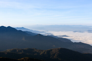 Sea of mist and clouds view from the highest mountain in Thailand. Doi Inthanon National Park. Amazing Northern Thailand Landscape.