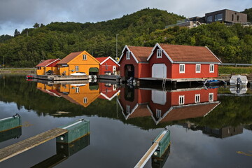 Colorful houses at the bay Svennevikbukta at Svennevik in Norway, Europe

