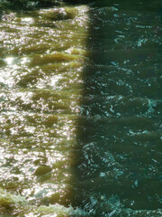 Duality of Flow. River Separation by Shadow Line, Embodying Two Worlds. Duel of life.