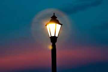 street lamp on sunset sky background - obrazy, fototapety, plakaty