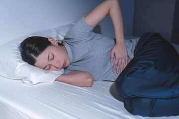 Flatulence ulcer, asian young woman, girl hands in belly, stomach pain from food poisoning,...