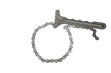 Detail of the universal wrench to remove engine oil filter on white background. Chain type filter...