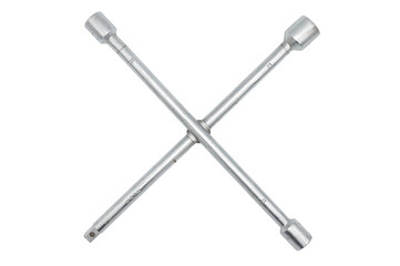 Detail of a typical and classic cross-shaped socket wrench for car wheel screws and bolts on a...