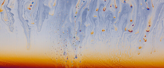 Colorful liquid mixture, blending paints in dynamic abstract fluid texture background, close up...