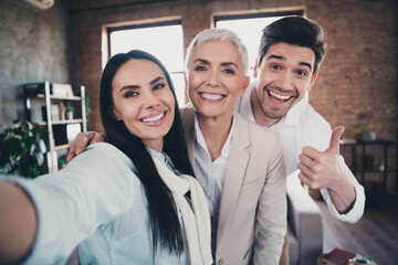 Portrait of group friendly corporate coworkers maker selfie show thumb up loft interior modern...
