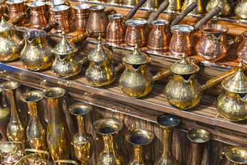 Turkish coffee makers and vases  with embossed patterns - obrazy, fototapety, plakaty