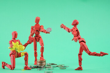 The photo shows three figures: one is a man with money, the other is a man with flowers and a heart, and a female figure reaching for money. This visual embodiment can be interpreted as a choice betwe