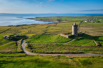 Doonagore castle tower in a setting sun, Co. Clare, Ireland