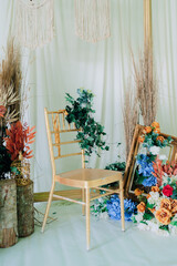 decorative flowers on the left side of the mini dais for guests who want to take pictures. 