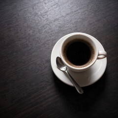 Fototapeta premium Eine Kaffeetasse auf einem Tisch