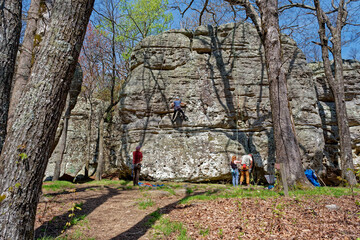 Climbers on a boulder
