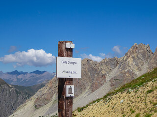 Scenic view from mountain summit Colle Cologna near rifugio della Gardetta in Maira valley in Cottian Alps, Piedmont, Italy, Europe. Hiking on alpine pasture on sunny summer day in mountains