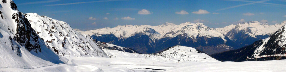 Panoramic view of the ski slopes of the famous La Plagne-Bellecote ski resort in the heart of the French Alps in the Tarentaise valley at the foot of Mont Blanc