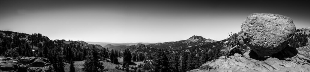 Panoramic view of a boulder at the trailhead parking lot to Bumpass Hell in Lassen Volcanic...