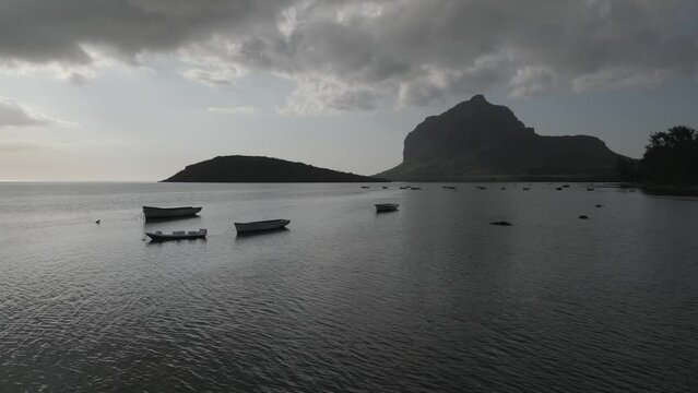 Drone view of Le Morne and boats in Indian Ocean from Le Morne village, Mauritius, Indian Ocean, Africa