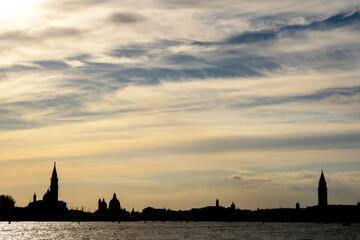 Fototapeta premium Venice, Italy: the city skyline at sunset time in spring