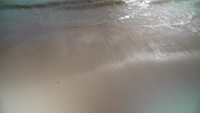 View of waves lapping on beach near Puerto Morelos, Caribbean Coast, Yucatan Peninsula, Mexico, North America
