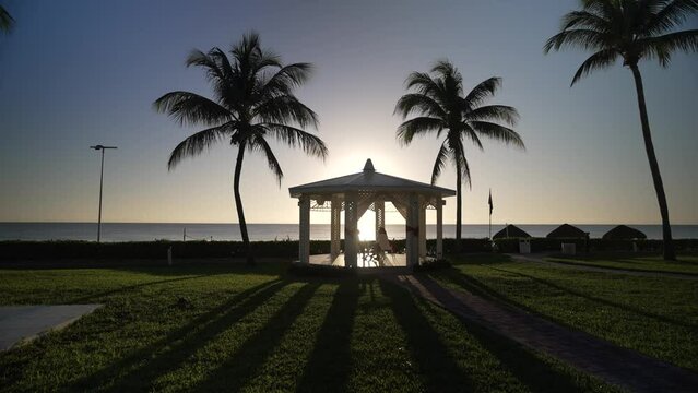 View of wedding bandstand and sea at sunrise near Puerto Morelos, Caribbean Coast, Yucatan Peninsula, Mexico, North America