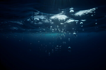 Serene underwater scene with bubbles rising to the surface during twilight