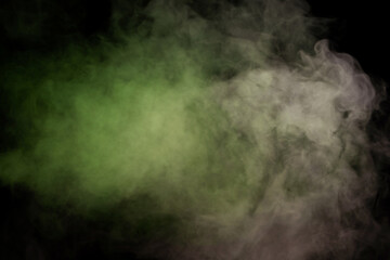 Green and white steam on a black background.