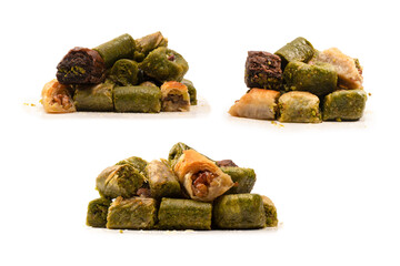 Turkish pistachio baklava isolated on a white background. A variety of turkish sweet baklava.