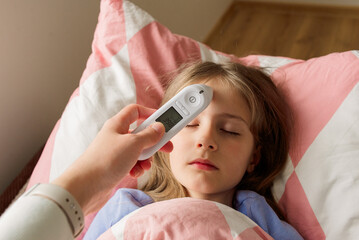 sick girl with fever temperature. high quality photo