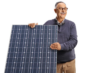 Happy mature man behind a solar panel