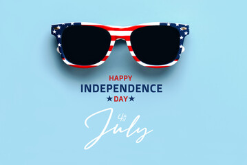 Happy Independence day July 4th. Closeup of USA flag sunglasses with text Happy Independence day...