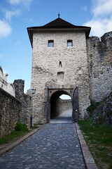 Fototapeta na wymiar View of a Trencin castle entrance and clock tower