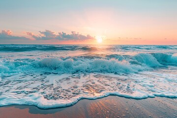 A serene beach scene at sunset, with waves crashing and a colorful sky.