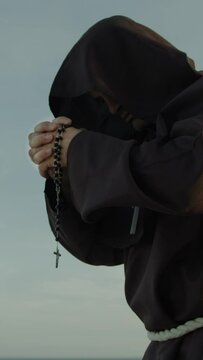 Religious Monk Prays Alone The Rosary Crucifix Lonely In Nature