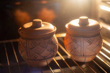 Pots in the oven