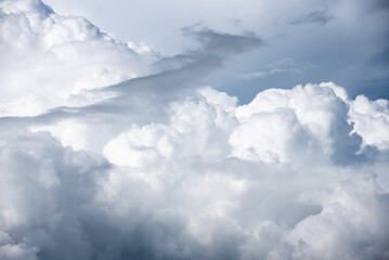 Nimbocumulus and stratus clouds on a stormy sky