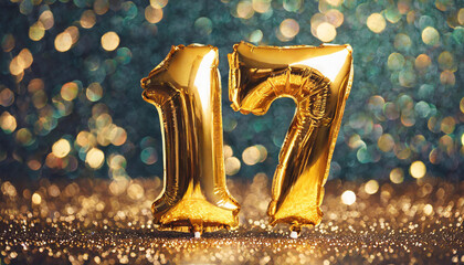 Banner with number 17 golden balloon. 17 years anniversary celebration. Blue glitter bokeh