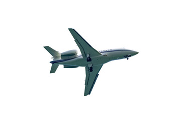 Isolated shot of a private business jet right preparing for landing on a transparent background. 