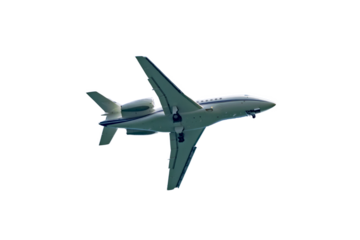 Isolated shot of a private business jet right preparing for landing on a transparent background. 