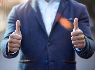 Business man, thumbs up and agree in city, thank you and motivation for winner in outdoors. Male person, support and like emoji or sign for approval in urban town, feedback and review or promotion