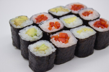 Vibrant Veggie Sushi Maki on White Backdrop
