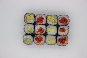 Colorful Vegetable Sushi Rolls on White Background