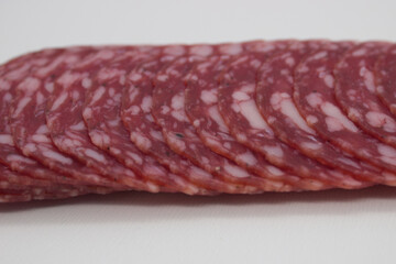 Sliced Cured Salami on Wooden Backdrop
