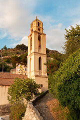 Fototapeta na wymiar San Lurenzu church, Lama, Balagne, Corsica, France. Church bell tower in the village of Lama in the Balagne region of Corsica.